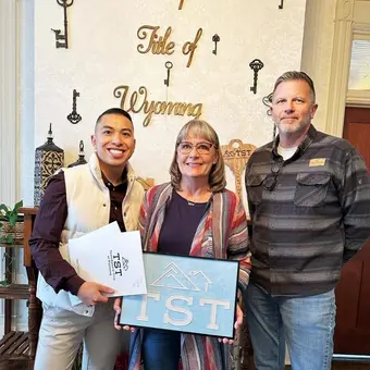 Happy Cheyenne homeowners at closing